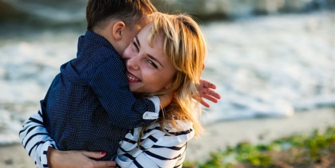 Woman holding boy