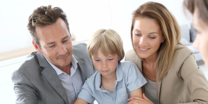 Parents holding child