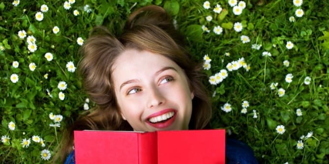 Happy woman with book