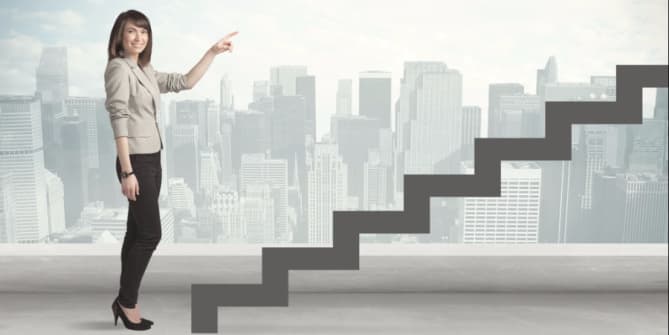 Woman pointing at staircase