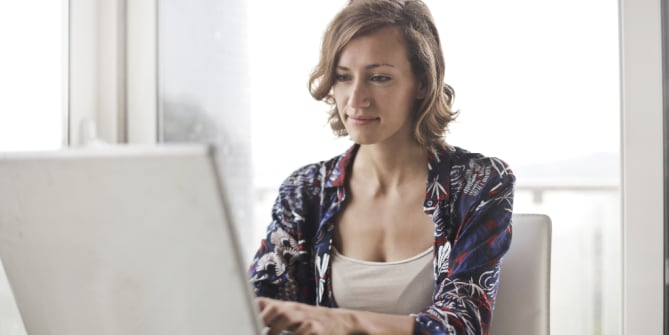 woman writing thank you note