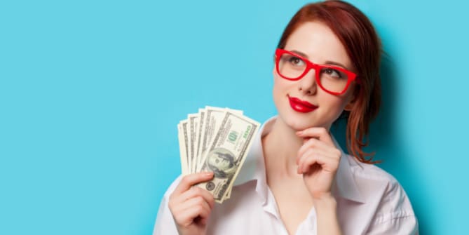 Woman holding money