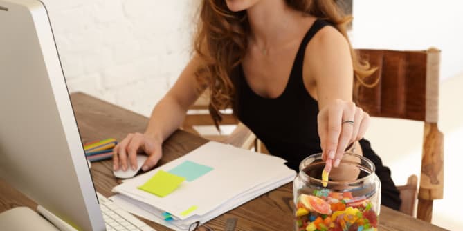 woman snacking at work