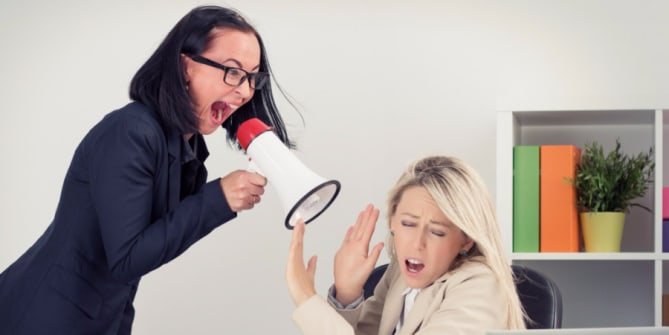 Employee shouting at another employee