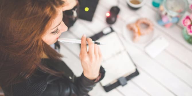 Woman taking notes