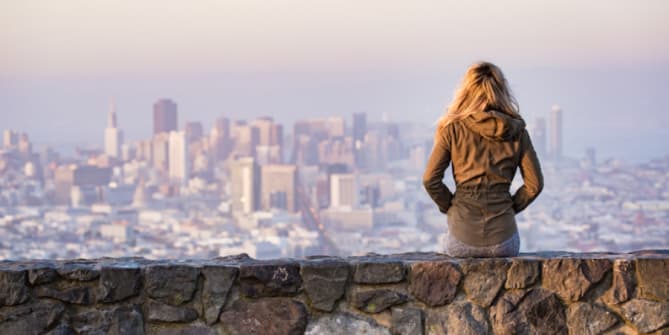 Woman Looking at Cityscape
