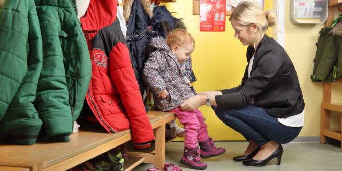woman picking up daughter at school