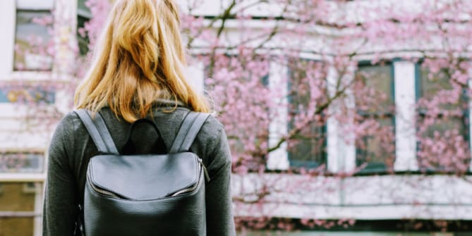 A picture of a girl with a backpack 