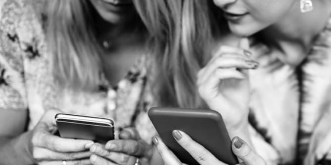 Women looking at networking app