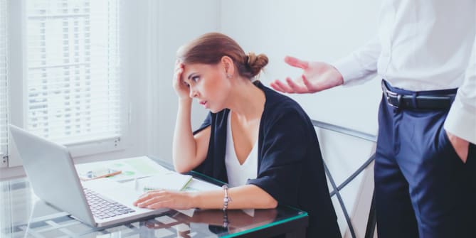 Woman facing sexism at work