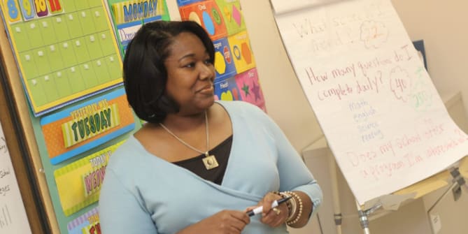 teacher in elementary school classroom