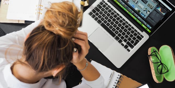 stressed pregnant woman at work