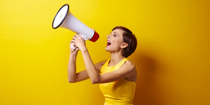 Woman using megaphone