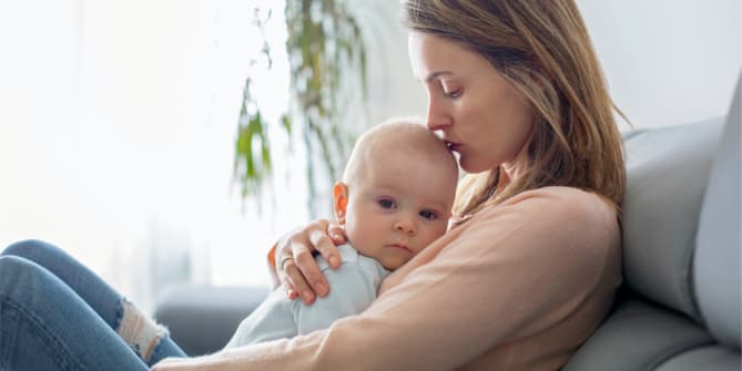 Woman with sick baby