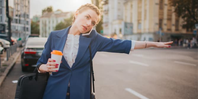 Woman hailing a cab