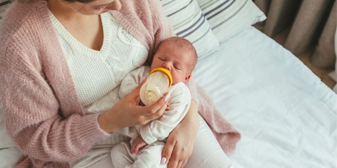 woman holding baby