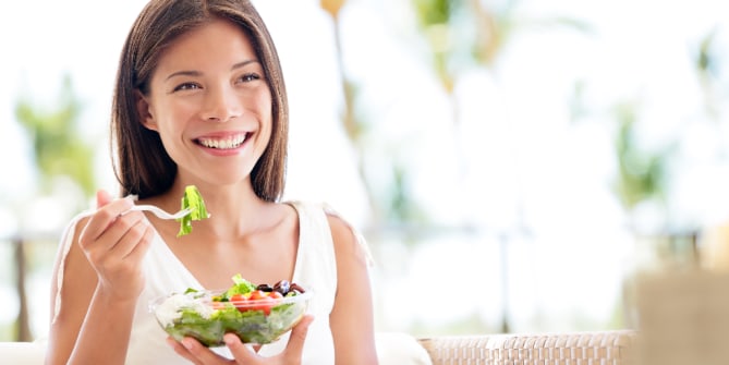woman eating a salad