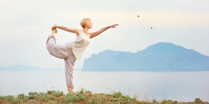 Woman Alone on Vacation, Doing Yoga