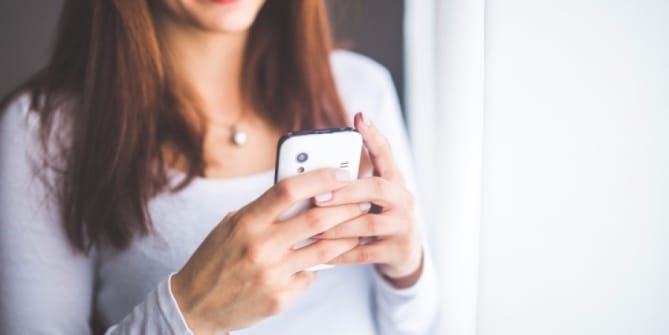 woman looking at messages