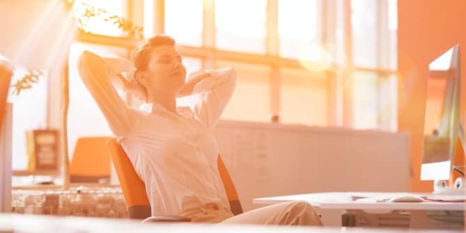 Woman relaxing at desk