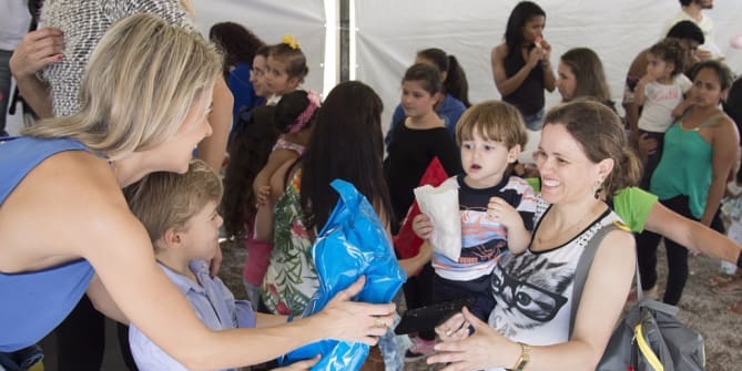Volunteers working with children