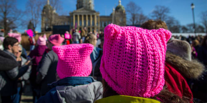 Women's March featuring "still we rise" sign