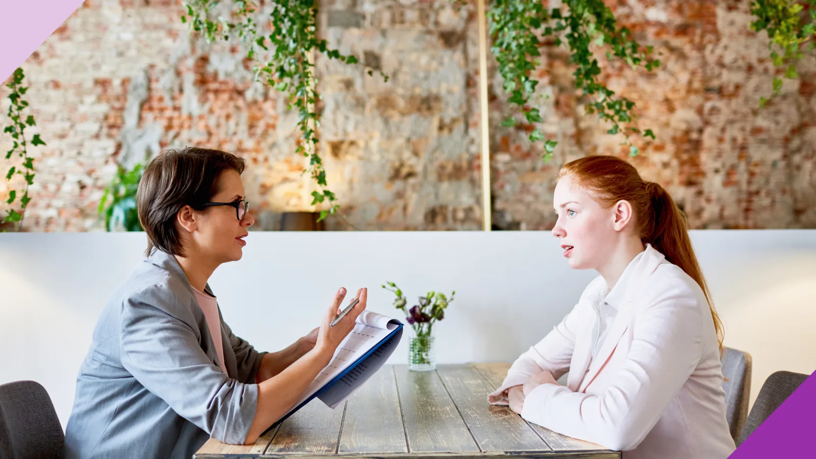 A candidate and recruiter talking, illustrating how to answer “Are you interviewing with other companies?”