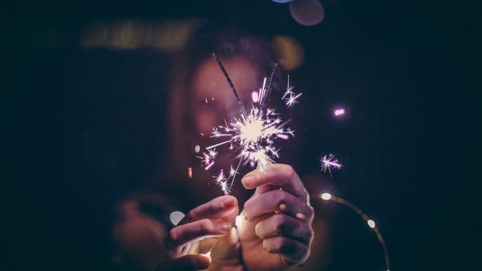 girl with sparklers in her hands
