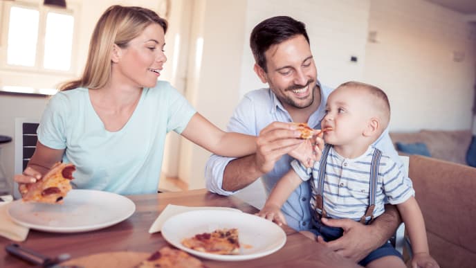 Family with pizza