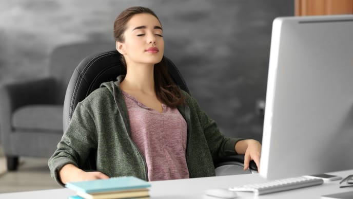 woman relaxing at work