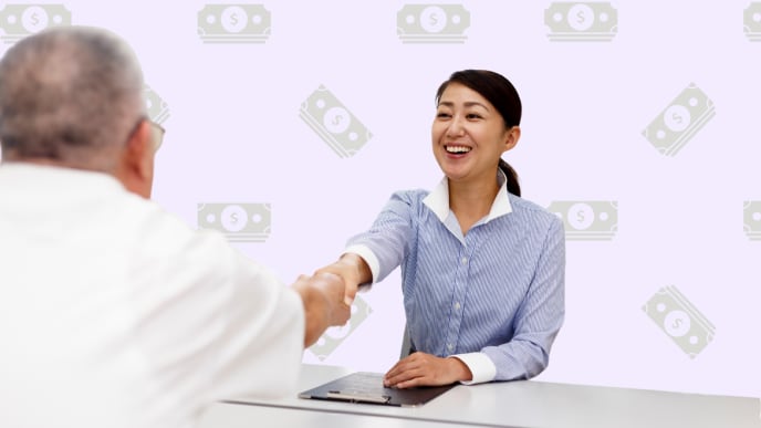 woman shaking hands in interview