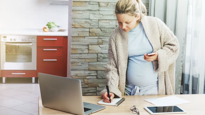 Pregnant woman working
