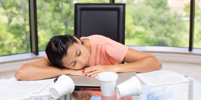 Woman napping at desk