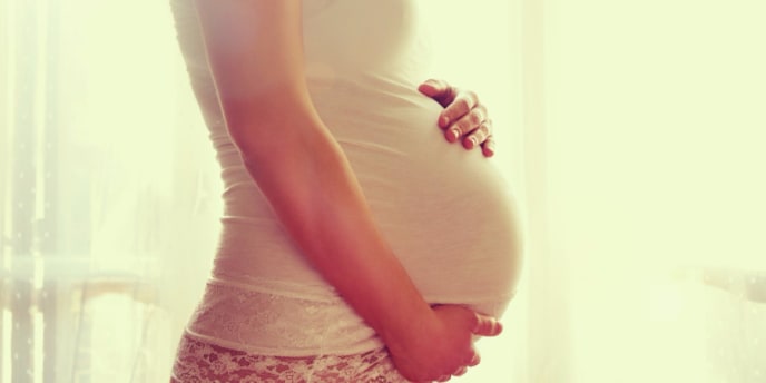 Woman's pregnant stomach