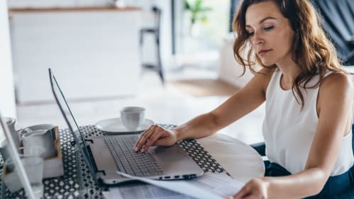 Woman looking at resume