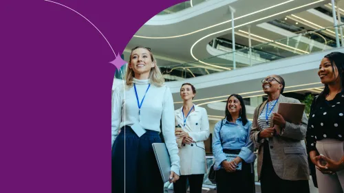 Coworkers standing together sightseeing the upcoming future potential