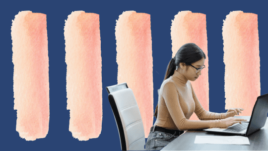 woman typing on a laptop