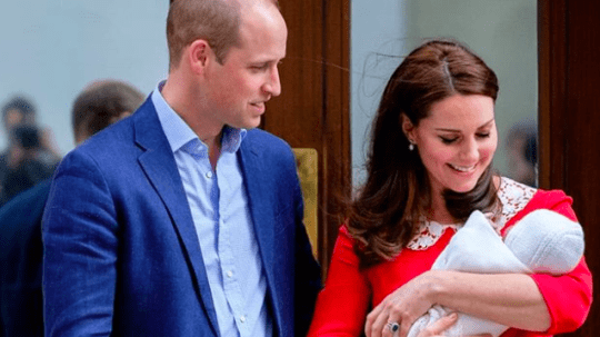 Kate and Prince William with their child.