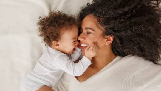 mother and child laughing 