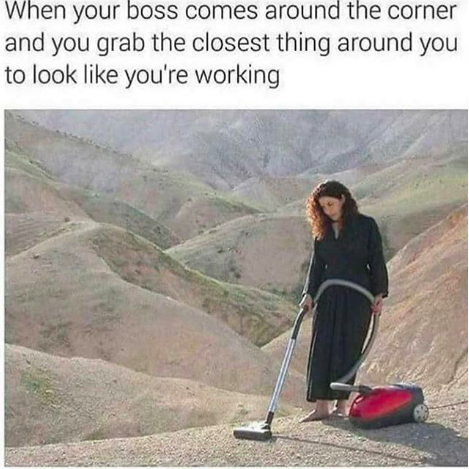 at work like meme with woman vacuuming